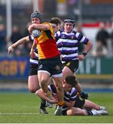 4 March 2025; Tadg Young of St Fintan's High School is tackled by Gareth Morgan of Terenure College during the Bank of Ireland Leinster Schools Senior Cup semi-final match between St Fintan's High School and Terenure College at Energia Park in Dublin. Photo by Shauna Clinton/Sportsfile