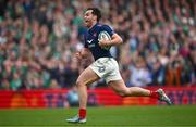 8 March 2025; Damian Penaud of France celebrates as he runs in to score his side's fifth try during the Guinness Six Nations Rugby Championship match between Ireland and France at the Aviva Stadium in Dublin. Photo by Seb Daly/Sportsfile