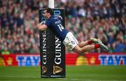 8 March 2025; Damian Penaud of France celebrates as he dives over to score his side's fifth try during the Guinness Six Nations Rugby Championship match between Ireland and France at the Aviva Stadium in Dublin. Photo by Seb Daly/Sportsfile