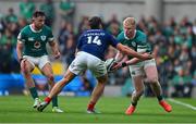 8 March 2025; Jamie Osborne of Ireland is tackled by Damian Penaud of France during the Guinness Six Nations Rugby Championship match between Ireland and France at the Aviva Stadium in Dublin. Photo by Brendan Moran/Sportsfile