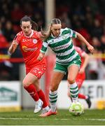 8 March 2025; Joy Ralph of Shamrock Rovers in action against Roma McLaughlin of Shelbourne during the SSE Airtricity Women's Premier Division match between Shelbourne and Shamrock Rovers at Tolka Park in Dublin. Photo by Stephen McCarthy/Sportsfile