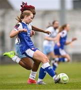 8 March 2025; Grace McInerney of Treaty United in action against Nancy Edogiawerie of Waterford during the SSE Airtricity Women's Premier Division match between Treaty United and Waterford at Markets Field in Limerick. Photo by Piaras Ó Mídheach/Sportsfile