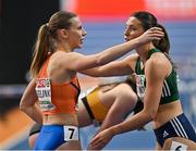 9 March 2025; Kate O'Connor of Ireland, right, Marijke Esselink of Netherlands after competing in the 60m hurdles event of the women's pentathlon during day four of the European Athletics Indoor Championships 2025 at the Omnisport Apeldoorn in Apeldoorn, Netherlands. Photo by Sam Barnes/Sportsfile