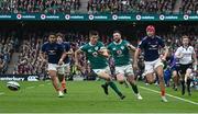 8 March 2025; Louis Bielle-Biarrey of France, right, in action against Sam Prendergast of Ireland on his way to scoring his side's third try during the Guinness Six Nations Rugby Championship match between Ireland and France at the Aviva Stadium in Dublin. Photo by Seb Daly/Sportsfile