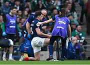 8 March 2025; Pierre-Louis Barassi of France receives medical attention during the Guinness Six Nations Rugby Championship match between Ireland and France at the Aviva Stadium in Dublin. Photo by Brendan Moran/Sportsfile Photo by Brendan Moran/Sportsfile