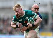 8 March 2025; Jamie Osborne of Ireland is tackled by Maxime Lucu of France during the Guinness Six Nations Rugby Championship match between Ireland and France at the Aviva Stadium in Dublin. Photo by Brendan Moran/Sportsfile Photo by Brendan Moran/Sportsfile