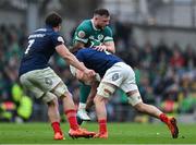 8 March 2025; Robbie Henshaw of Ireland is tackled by Oscar Jego of France during the Guinness Six Nations Rugby Championship match between Ireland and France at the Aviva Stadium in Dublin. Photo by Brendan Moran/Sportsfile Photo by Brendan Moran/Sportsfile