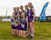 8 March 2025; The Mount Lourdes Enniskillen team celebrate with the cup after winning the Minor Girls 2,000m team event during the 123.ie All Ireland Schools Cross Country Championships at Galway Racecourse in Ballybrit, Galway. Photo by Tom Beary/Sportsfile