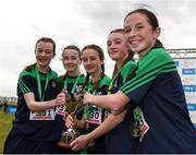 8 March 2025; The Santa Sabina team celebrate with the cup after winning the Junior Girls 2,500m team event during the 123.ie All Ireland Schools Cross Country Championships at Galway Racecourse in Ballybrit, Galway. Photo by Tom Beary/Sportsfile