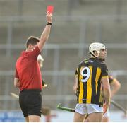 9 March 2025; Jordan Molloy of Kilkenny is shown a red card by referee Sean Stack during the Allianz Hurling League Division 1A match between Kilkenny and Tipperary at UPMC Nowlan Park in Kilkenny. Photo by Stephen McCarthy/Sportsfile