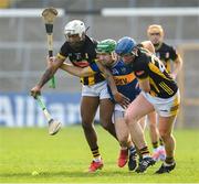 9 March 2025; Noel McGrath of Tipperary in action against Zach Bay Hammond, left, and John Donnelly of Kilkenny during the Allianz Hurling League Division 1A match between Kilkenny and Tipperary at UPMC Nowlan Park in Kilkenny. Photo by Stephen McCarthy/Sportsfile