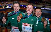 9 March 2025; Team Ireland athletes, from left, Mark English with his bronze medal from the men's 800m, Sarah Healy with her gold medal from the women's 3000m and Kate O'Connor with her bronze medal from the women's pentathlon on day four of the European Athletics Indoor Championships 2025 at the Omnisport Apeldoorn in Apeldoorn, Netherlands. Photo by Sam Barnes/Sportsfile