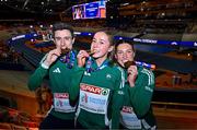 9 March 2025; Team Ireland athletes, from left, Mark English with his bronze medal from the men's 800m, Sarah Healy with her gold medal from the women's 3000m and Kate O'Connor with her bronze medal from the women's pentathlon on day four of the European Athletics Indoor Championships 2025 at the Omnisport Apeldoorn in Apeldoorn, Netherlands. Photo by Sam Barnes/Sportsfile