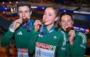 9 March 2025; Team Ireland athletes, from left, Mark English with his bronze medal from the men's 800m, Sarah Healy with her gold medal from the women's 3000m and Kate O'Connor with her bronze medal from the women's pentathlon on day four of the European Athletics Indoor Championships 2025 at the Omnisport Apeldoorn in Apeldoorn, Netherlands. Photo by Sam Barnes/Sportsfile