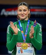 9 March 2025; Kate O'Connor of Ireland waits to be presented with her bronze medal from the women's pentathlon on day four of the European Athletics Indoor Championships 2025 at the Omnisport Apeldoorn in Apeldoorn, Netherlands. Photo by Sam Barnes/Sportsfile