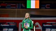 9 March 2025; Sarah Healy of Ireland with her gold medal while listening to her national anthem after winning the women's 3000m final on day four of the European Athletics Indoor Championships 2025 at the Omnisport Apeldoorn in Apeldoorn, Netherlands. Photo by Sam Barnes/Sportsfile