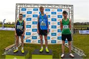 8 March 2025; Gold medalist Darragh Whelan of Castletroy College with Ethan Bramhill of Greystones Community College who finished second and David Frazer of Calasanctius College Oranmore who finished third in the Junior Boys 3,500m during the 123.ie All Ireland Schools Cross Country Championships at Galway Racecourse in Ballybrit, Galway. Photo by Tom Beary/Sportsfile