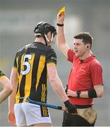 9 March 2025; David Blanchfield of Kilkenny is shown a yellow card by referee Sean Stack during the Allianz Hurling League Division 1A match between Kilkenny and Tipperary at UPMC Nowlan Park in Kilkenny. Photo by Stephen McCarthy/Sportsfile