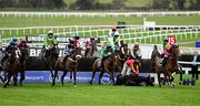 11 March 2025: Guard Your Dreams, with Kielan Woods up, falls at the first fence during the Ultima Handicap Chase on day one of the Cheltenham Racing Festival at Prestbury Park in Cheltenham, England. Photo by David Fitzgerald/Sportsfile