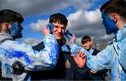 11 March 2025; St Vincent's Castleknock College supporters paint the faces of fellow students before the Bank of Ireland Leinster Rugby Boys Schools Junior Cup semi-final match between Blackrock College and St Vincent's Castleknock College at Energia Park in Dublin. Photo by Shauna Clinton/Sportsfile