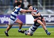 11 March 2025; Sam Cunningham of St Vincent's Castleknock College is tackled by Peter Le Roux of Blackrock College during the Bank of Ireland Leinster Rugby Boys Schools Junior Cup semi-final match between Blackrock College and St Vincent's Castleknock College at Energia Park in Dublin. Photo by Shauna Clinton/Sportsfile