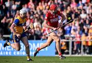 9 March 2025; Brian Hayes of Cork on his way to scoring his side's third goal, as Conor Cleary of Clare gives chase, during the Allianz Hurling League Division 1A match between Clare and Cork at Zimmer Biomet Páirc Chíosóg in Ennis, Clare. Photo by Piaras Ó Mídheach/Sportsfile