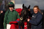 12 March 2025; Jockey Keith Donoghue, centre, celebrates with Winning Connections after winning The Glenfarclas Cross Country Steeple Chase with Stumptown on day two of the Cheltenham Racing Festival at Prestbury Park in Cheltenham, England. Photo by Harry Murphy/Sportsfile