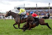 12 March 2025; Quilixios, unseats rider Darragh O'Keeffe as he falls at the last as eventual winner Marine Nationale, 6, with Sean Flanagan up, races for the finish on it's way to winning The BetMGM Queen Mother Champion Steeple Chase on day two of the Cheltenham Racing Festival at Prestbury Park in Cheltenham, England. Photo by Harry Murphy/Sportsfile