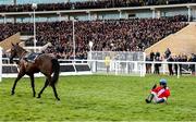 12 March 2025; Darragh O'Keeffe sits on the grass after bring unseated by Quilixios after falling at the last during The BetMGM Queen Mother Champion Steeple Chase on day two of the Cheltenham Racing Festival at Prestbury Park in Cheltenham, England. Photo by Harry Murphy/Sportsfile