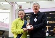 12 March 2025; Jockey Sean Flanagan, left, celebrates with trainer and owner Barry Connell, after winning The BetMGM Queen Mother Champion Steeple Chase with Marine Nationale on day two of the Cheltenham Racing Festival at Prestbury Park in Cheltenham, England. Photo by David Fitzgerald/Sportsfile