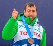 12 March 2025; Clive Healy of Team Ireland, a member of Waterford Special Olympics Club, Waterford City with his Bronze Medal during day four of the Turin 2025 Special Olympics World Winter Games in Sestriere, Italy. Photo by Ray McManus/Sportsfile