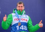 12 March 2025; Clive Healy of Team Ireland, a member of Waterford Special Olympics Club, Waterford City with his Bronze Medal during day four of the Turin 2025 Special Olympics World Winter Games in Sestriere, Italy. Photo by Ray McManus/Sportsfile