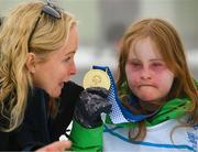 12 March 2025; Karen Coventry, Director of Sport, Special Olympics Ireland, with Maire Connelly of Team Ireland, a member of Kilternan Karvers, Clanbridge, Galway with her Gold Medal, won in the Novice Giant Slalon Final, during day four of the Turin 2025 Special Olympics World Winter Games in Sestriere, Italy. Photo by Ray McManus/Sportsfile