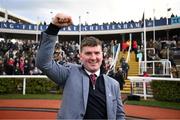 12 March 2025; Winning trainer Cian Collins celebrates after winning The Debenhams Johnny Henderson Grand Annual Handicap Steeple Chase Challenge Cup with Jazzy Matty on day two of the Cheltenham Racing Festival at Prestbury Park in Cheltenham, England. Photo by David Fitzgerald/Sportsfile