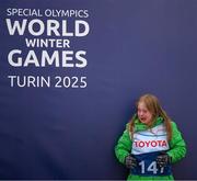 12 March 2025; Maire Connelly of Team Ireland, a member of Kilternan Karvers, Clanbridge, Galway with her Gold Medal, won in the Novice Giant Slalon Final, reacts as she was mistakenly positioned in line with the third place podium, during day four of the Turin 2025 Special Olympics World Winter Games in Sestriere, Italy. Photo by Ray McManus/Sportsfile