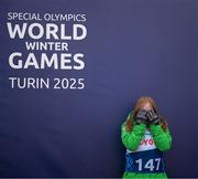 12 March 2025; Maire Connelly of Team Ireland, a member of Kilternan Karvers, Clanbridge, Galway with her Gold Medal, won in the Novice Giant Slalon Final, reacts as she was mistakenly positioned in line with the third place podium, during day four of the Turin 2025 Special Olympics World Winter Games in Sestriere, Italy. Photo by Ray McManus/Sportsfile