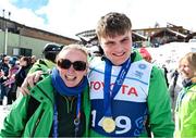 12 March 2025; Sinéad Costello, Head of Delegation Special Olympics Ireland, with Caolan McConville of Team Ireland, a member of Skiability Northern Ireland, Aghaghallon, Antrim, with his Gold Medal, a first ever Gold for a Special Olympics Ireland athlete at Advanced level, on day four of the Turin 2025 Special Olympics World Winter Games in Sestriere, Italy. Photo by Ray McManus/Sportsfile