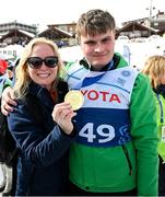 12 March 2025; Karen Coventry, Director of Sport, Special Olympics Ireland, with Caolan McConville of Team Ireland, a member of Skiability Northern Ireland, Aghaghallon, Antrim with his Gold Medal, a first ever Gold for a Special Olympics Ireland athlete at Advanced level, on day four of the Turin 2025 Special Olympics World Winter Games in Sestriere, Italy. Photo by Ray McManus/Sportsfile