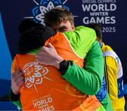 12 March 2025; Peadar McConville, with his son, Caolan McConville of Team Ireland, a member of Skiability Northern Ireland, Aghaghallon, Antrim, with his Gold Medal, a first ever Gold for a Special Olympics Ireland athlete at Advanced level, on day four of the Turin 2025 Special Olympics World Winter Games in Sestriere, Italy. Photo by Ray McManus/Sportsfile