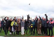 12 March 2025; Jockey Sean Flanagan, celebrates with Winning Connections, including trainer and owner Barry Connell, after winning The BetMGM Queen Mother Champion Steeple Chase with Marine Nationale on day two of the Cheltenham Racing Festival at Prestbury Park in Cheltenham, England. Photo by Harry Murphy/Sportsfile