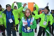 12 March 2025; Family members, mother Bríd and dad Michael with Maire Connelly of Team Ireland, a member of Kilternan Karvers, Clanbridge, Galway with her Gold Medal, won in the Novice Giant Slalon Final, during day four of the Turin 2025 Special Olympics World Winter Games in Sestriere, Italy. Photo by Ray McManus/Sportsfile