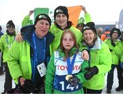 12 March 2025; Family members, mother Bríd, dad Michael and brother Eoin with Maire Connelly of Team Ireland, a member of Kilternan Karvers, Clanbridge, Galway with her Gold Medal, won in the Novice Giant Slalon Final, during day four of the Turin 2025 Special Olympics World Winter Games in Sestriere, Italy. Photo by Ray McManus/Sportsfile