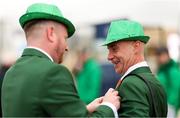 13 March 2025; Racegoers wearing fix each others suits prior to racing on day three of the Cheltenham Racing Festival at Prestbury Park in Cheltenham, England. Photo by Harry Murphy/Sportsfile