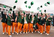 13 March 2025; Racegoers wearing Irish suits throw their hats in the air prior to racing on day three of the Cheltenham Racing Festival at Prestbury Park in Cheltenham, England. Photo by Harry Murphy/Sportsfile