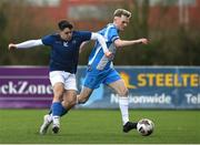 12 March 2025; Alex Halpin of Rice College in action against Archie Quinn of Blackrock College during the FAI Schools Dr Tony O'Neill Senior National Cup final match between Blackrock College and Rice College at Athlone Town Stadium in Athlone, Westmeath. Photo by Matt Browne/Sportsfile