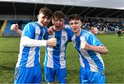 12 March 2025; Rice College players from left Ethan McGing, Rian Durkan and Sean Casey celebrate after the FAI Schools Dr Tony O'Neill Senior National Cup final match between Blackrock College and Rice College at Athlone Town Stadium in Athlone, Westmeath. Photo by Matt Browne/Sportsfile