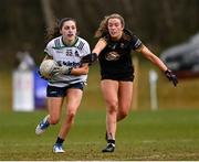 13 March 2025; Neesha Whelan of University of Limerick is tackled by Kacey Wright of TUS Midwest during the 2025 AIG Lagan Cup final match between TUS Midwest and University of Limerick at Queen's Sport in Belfast. Photo by Shauna Clinton/Sportsfile