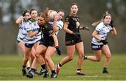 13 March 2025; Claire O'Donohue of University of Limerick is tackled by Maeve Stankard of TUS Midwest during the 2025 AIG Lagan Cup final match between TUS Midwest and University of Limerick at Queen's Sport in Belfast. Photo by Shauna Clinton/Sportsfile