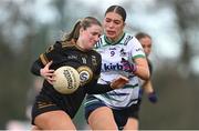 13 March 2025; Siun Fiztgibbon of TUS Midwest tackles Ava Burke of University of Limerick during the 2025 AIG Lagan Cup final match between TUS Midwest and University of Limerick at Queen's Sport in Belfast. Photo by Shauna Clinton/Sportsfile