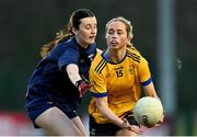 13 March 2025; Aobha Harmon of DCU Dóchas Éireann is tackled by Aine Bresnan of TUD during the 2025 AIG Moynihan Cup final match between TUD CC1 and DCU Dóchas Éireann at Queen's Sport in Belfast. Photo by Shauna Clinton/Sportsfile